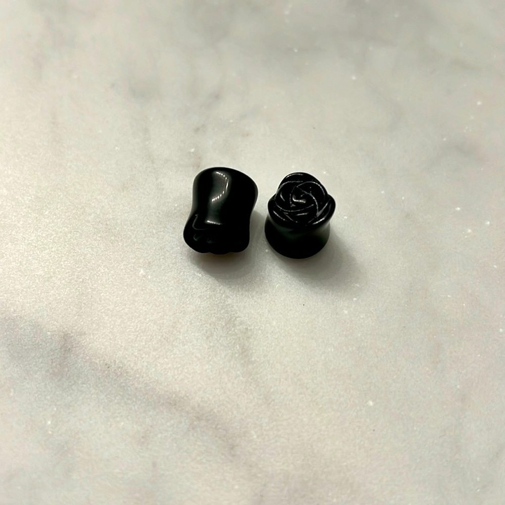 Ebony black bone rose double flare plugs for stretched ears. Gauge 00g +